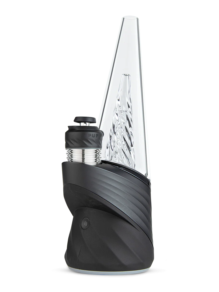 A clear glass pipe with a black base and a black cap, against a black background.