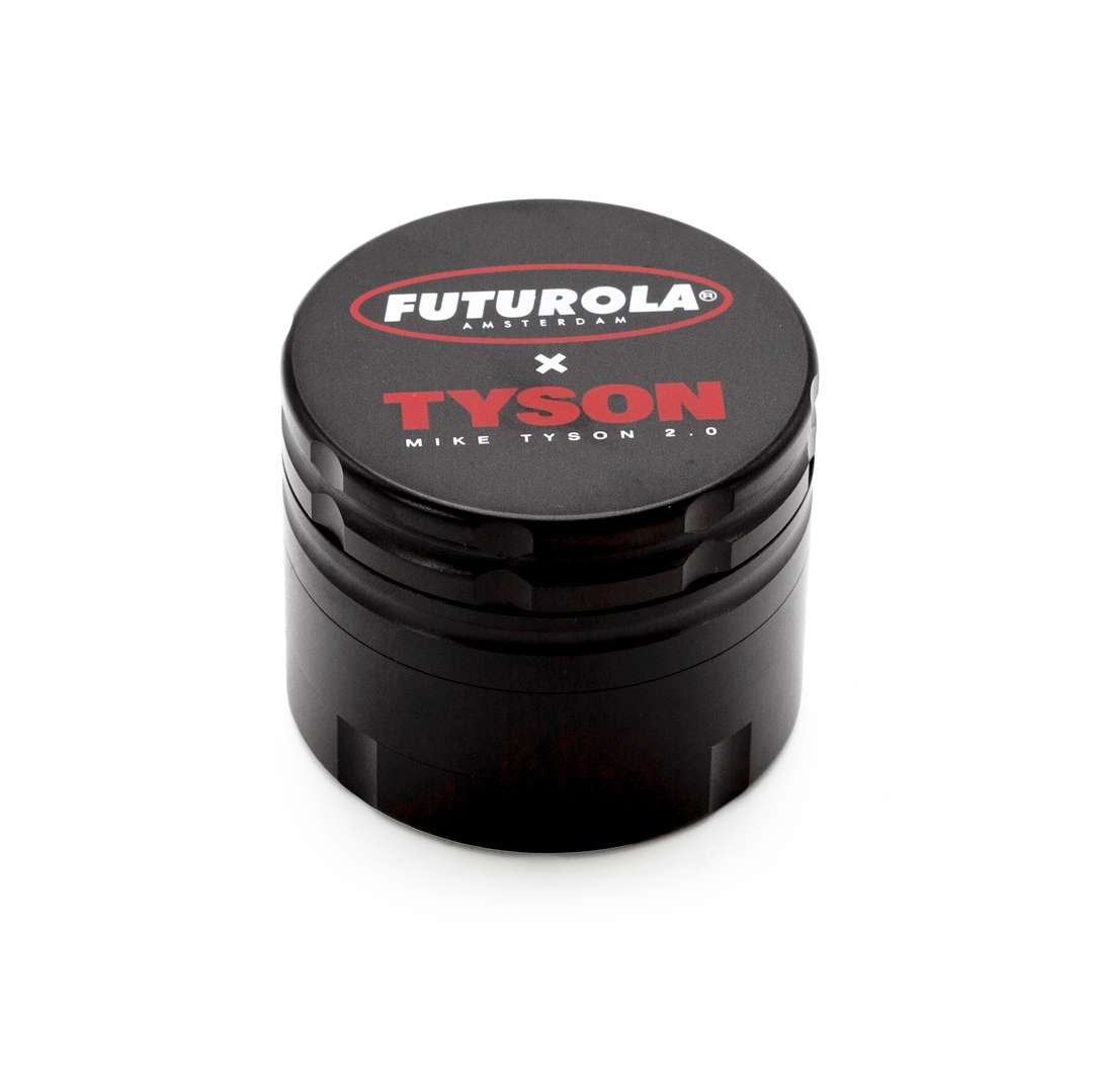 A black grinder with the Futurola logo and the name Tyson printed on it.