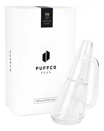 a clear glass pipe with a white box next to it, which is labeled as a special edition glass.