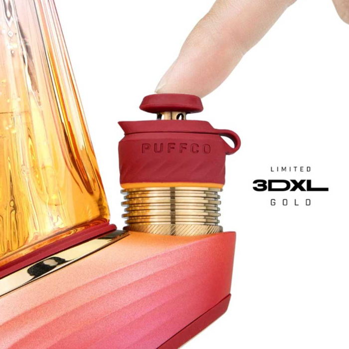 a close-up of a red and gold electronic device, possibly a smartphone or tablet, with a person's finger pressing a button on the device.