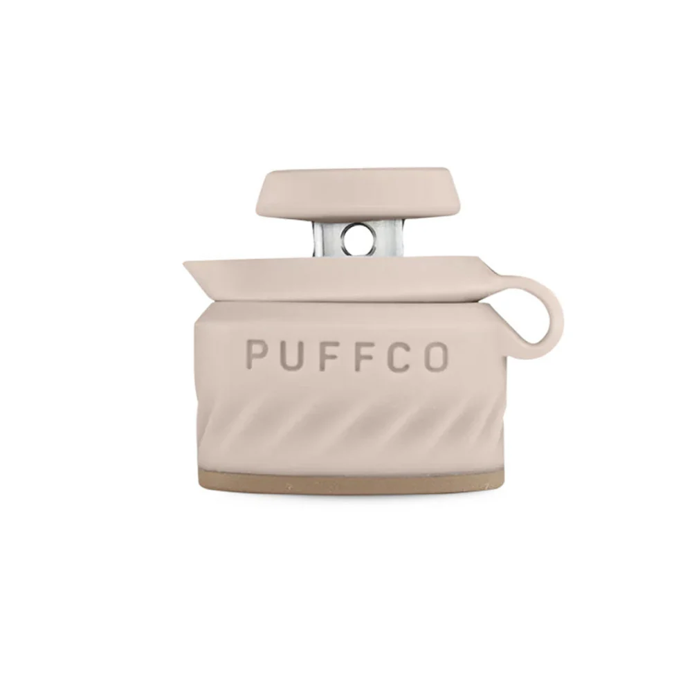 A beige-colored object with the word "PUFFCO" printed on it.