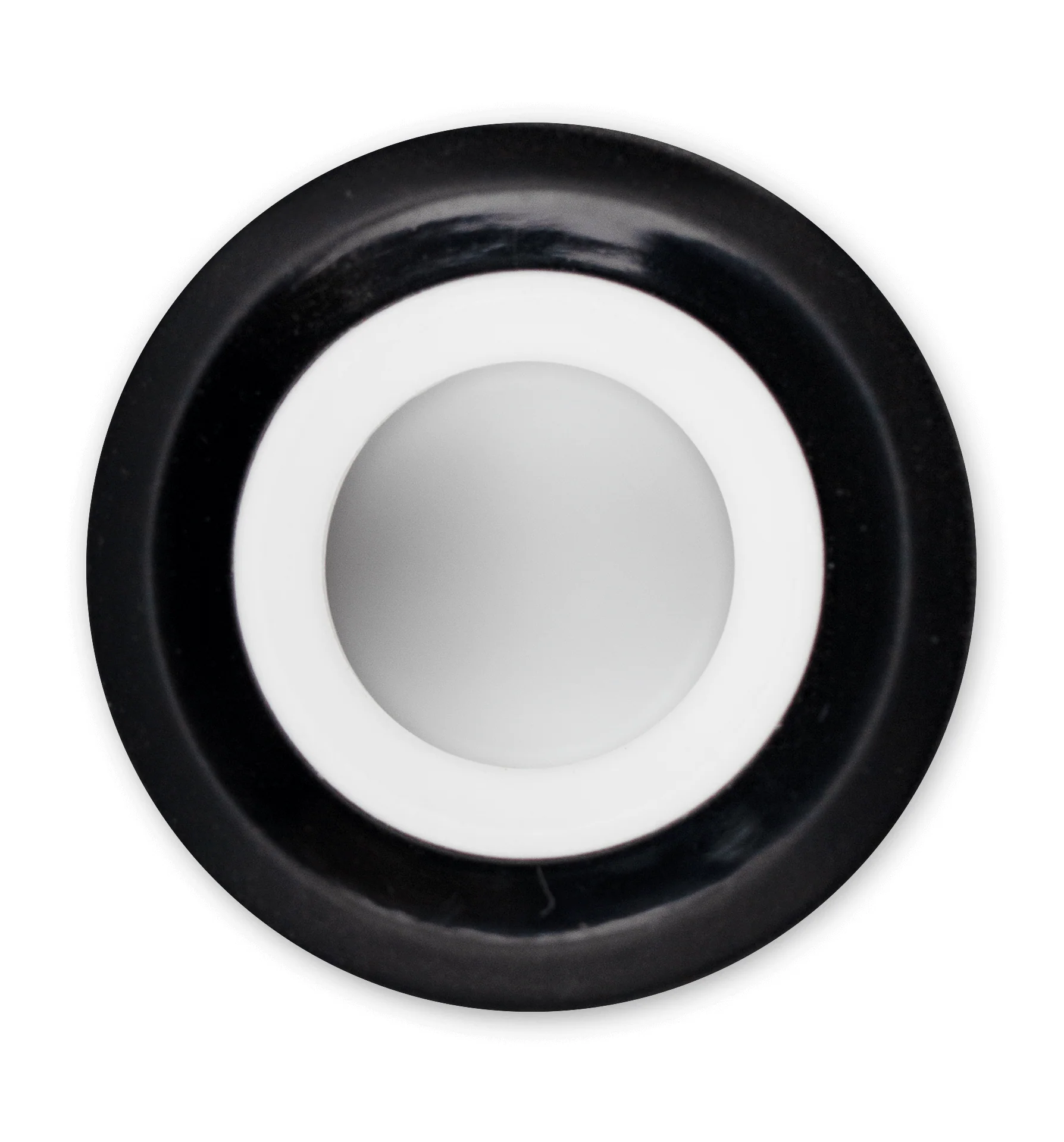 a black and white circular object with a white center.