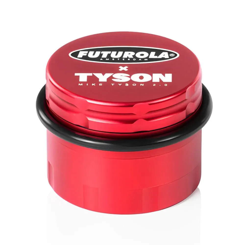 A red cylindrical container with a black ring around it, featuring the text "FUTUROLA AMBASSADY" and "TYSON" printed on it.