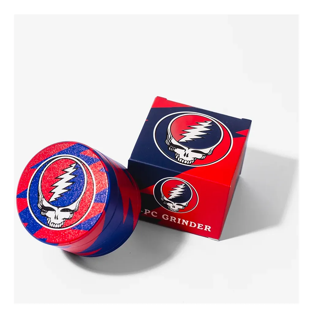 A blue and red grind grinder and its packaging are shown against a white background.