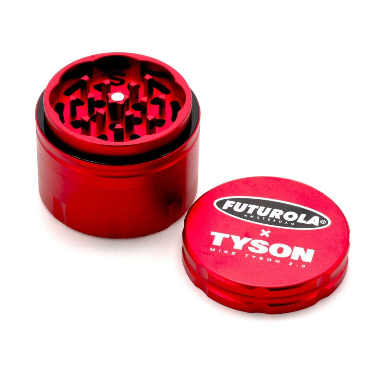 A red grinder and its lid are shown against a white background.