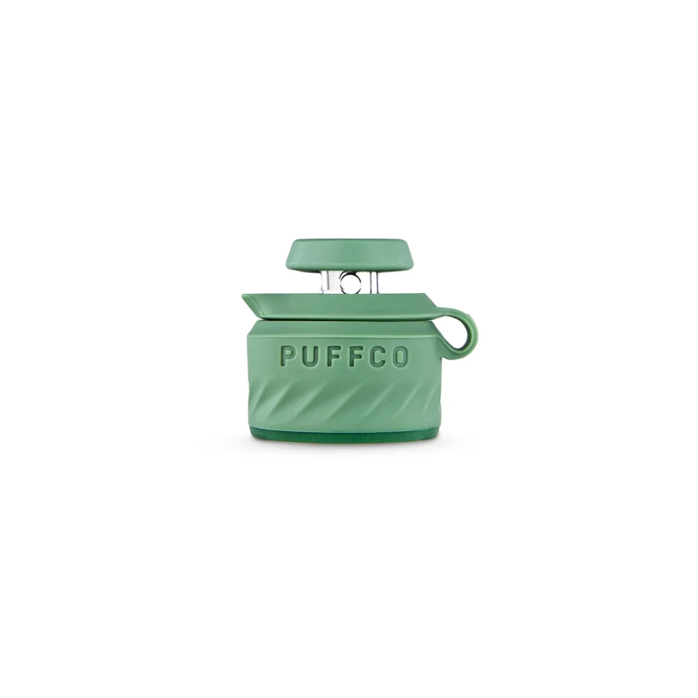 A green and silver object with the word "PUFFCO" printed on it.