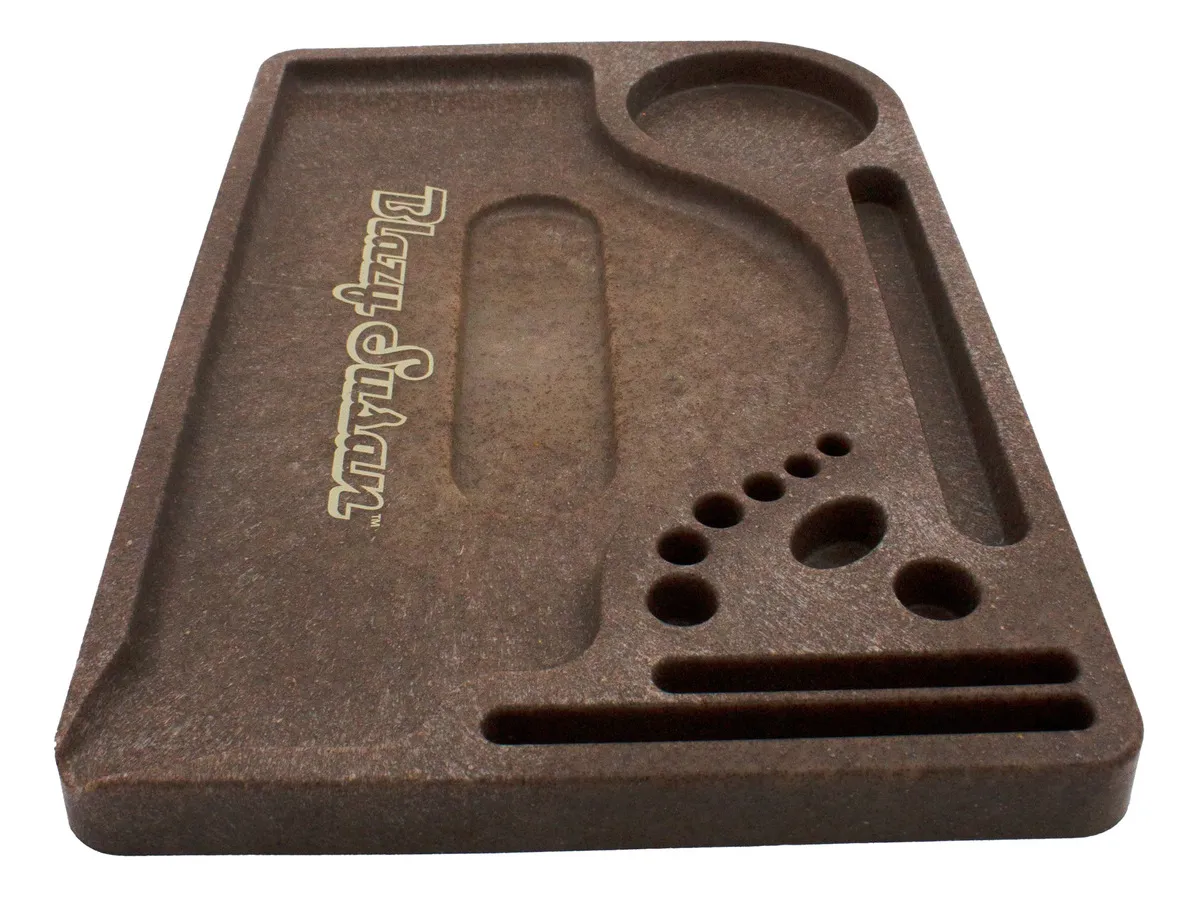 A brown, rectangular tray with various holes and compartments, likely used for organizing and storing small items.