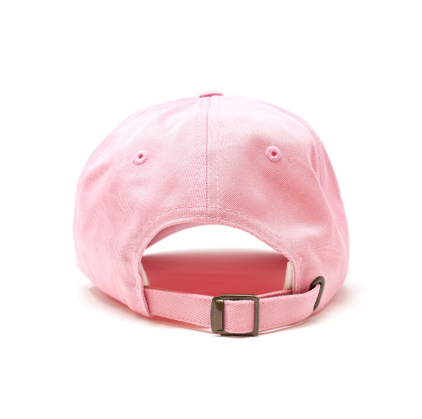 A pink baseball cap with a metal buckle and strap.