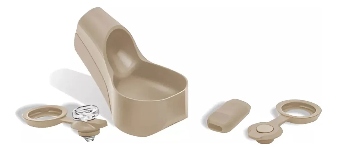 a tan-colored plastic object, which appears to be a part of a larger assembly or a model.