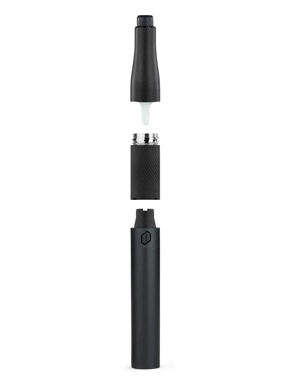 A cylindrical object with a metallic top is shown against a black background.