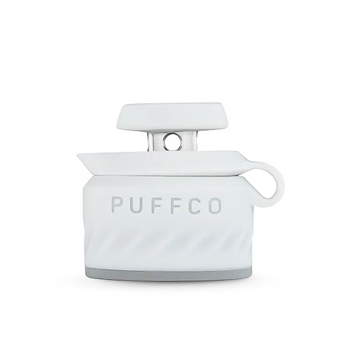 A white object with the word "PUFFCO" printed on it.