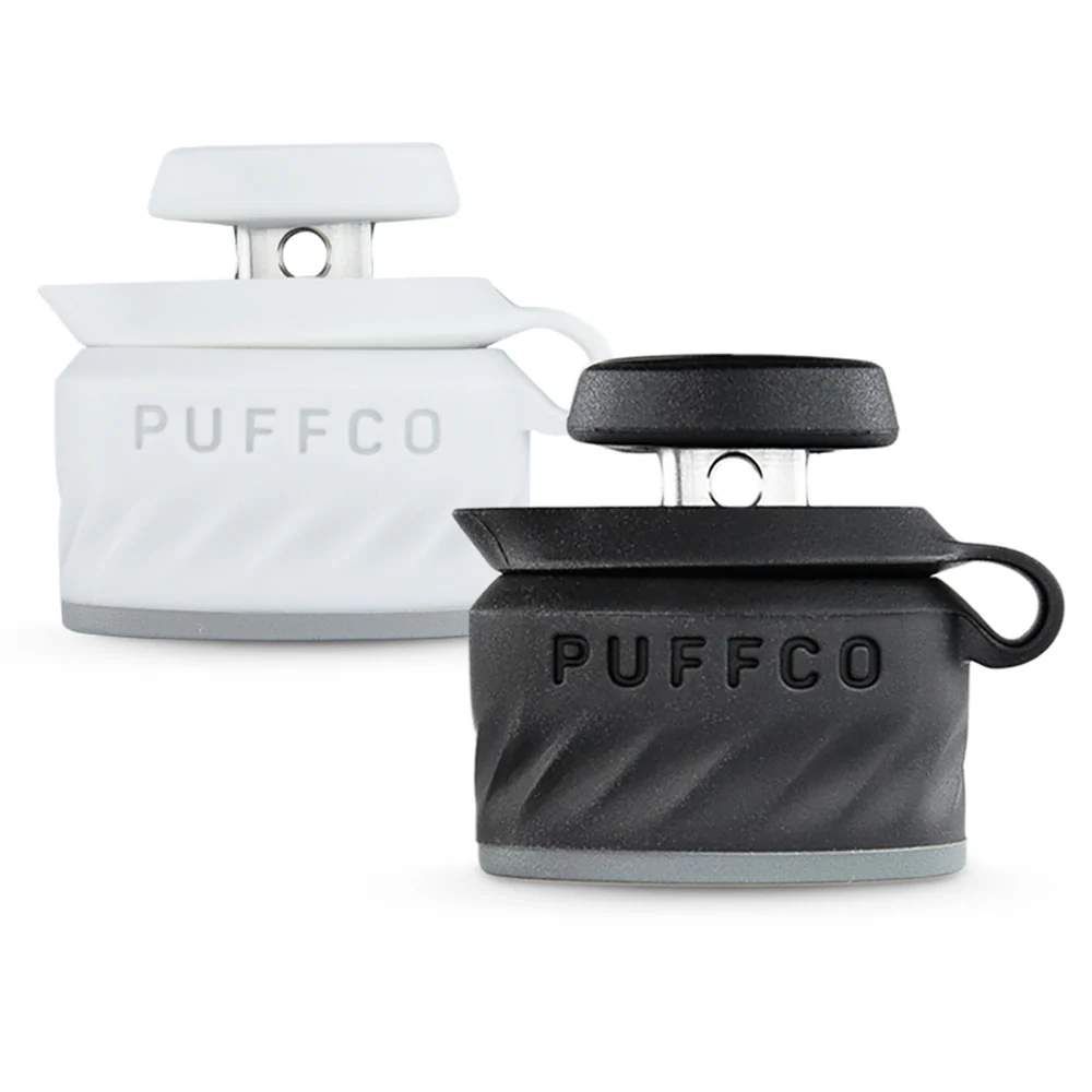 two Puffco kitchen gadgets, one white and one black, with the brand name "Puffco" printed on them.