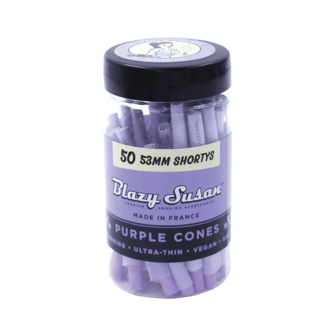 A clear glass jar filled with pink flavored smoking sticks, labeled as 50mm shortts.