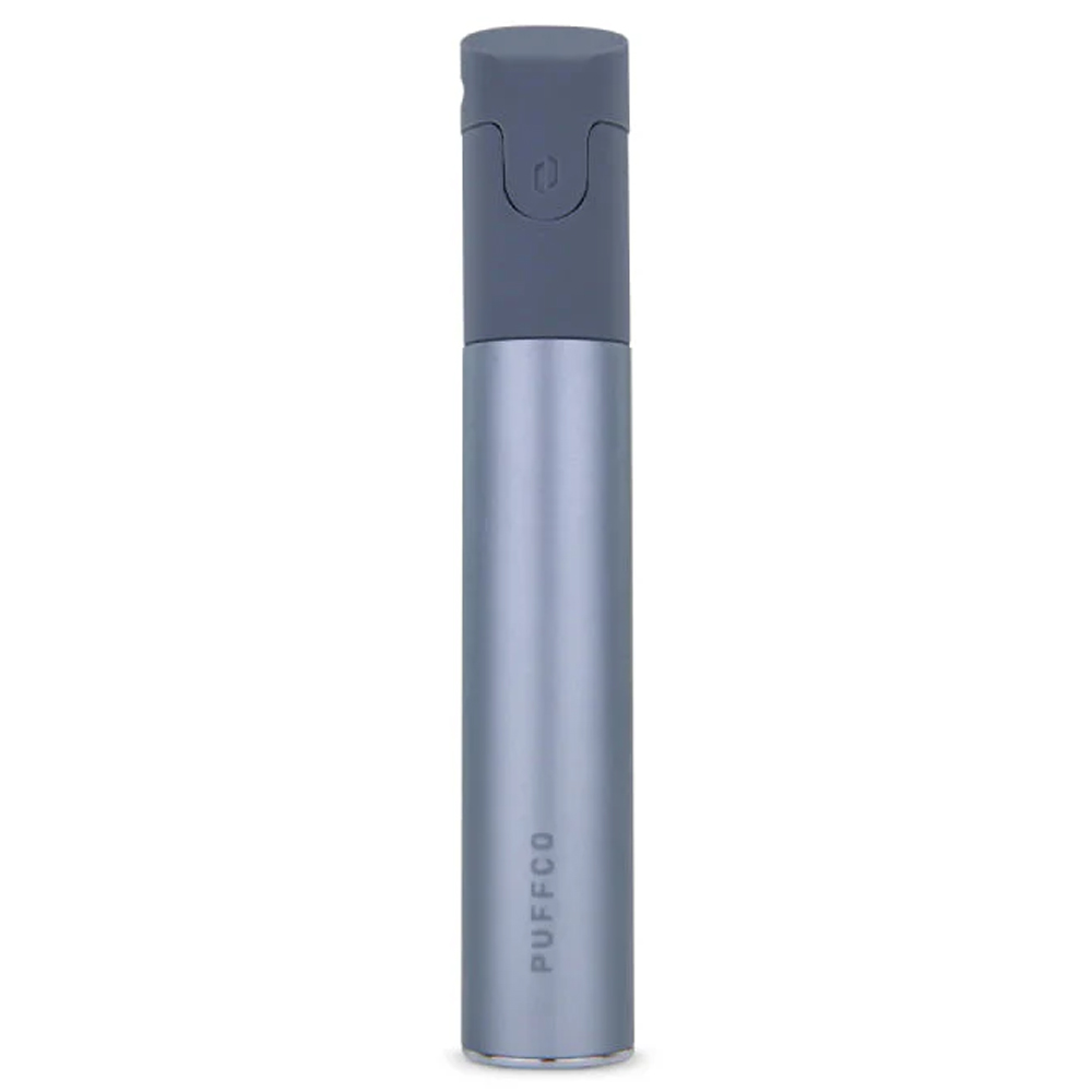 A gray electronic device with a black cap and the word "PUFFCO" printed on it.