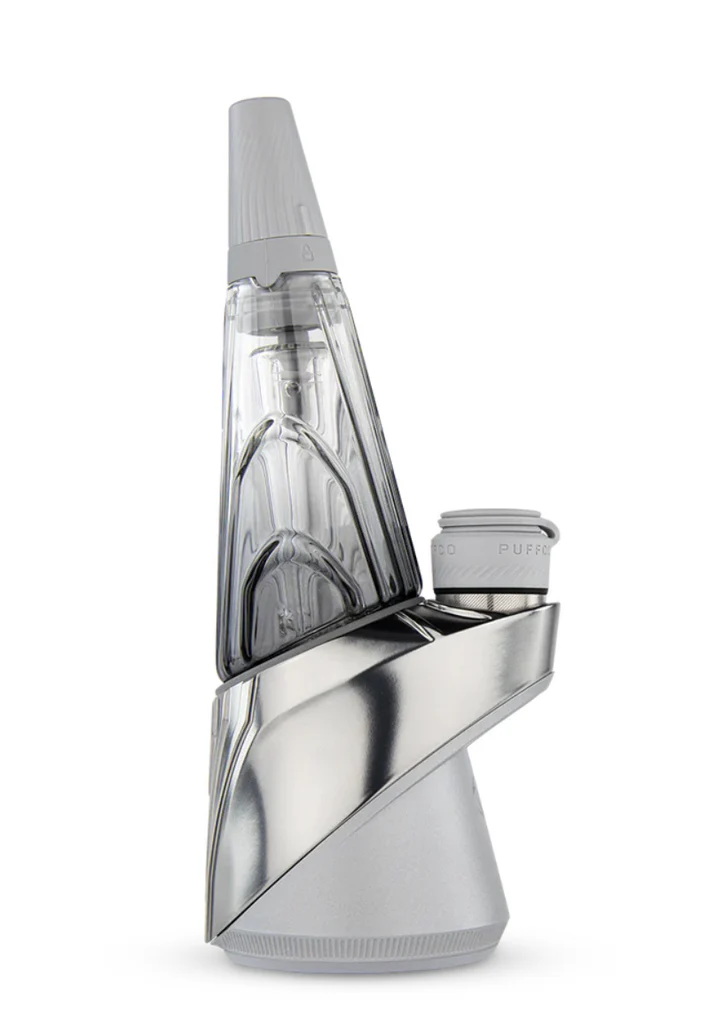 A clear glass bottle with a pointed top and a black base, standing upright against a white background.