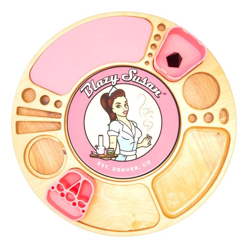 A pink circular tray with a cartoon illustration of a woman and the text "Blazys Susan" on it.