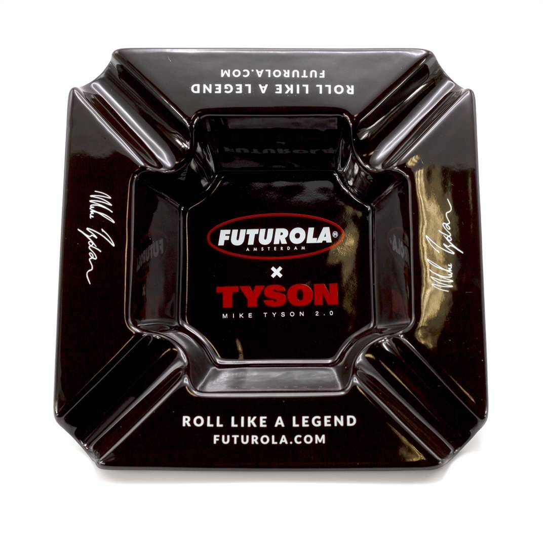 A black ashtray with the Futurola logo and the text "Roll Like A Legend" printed on it.