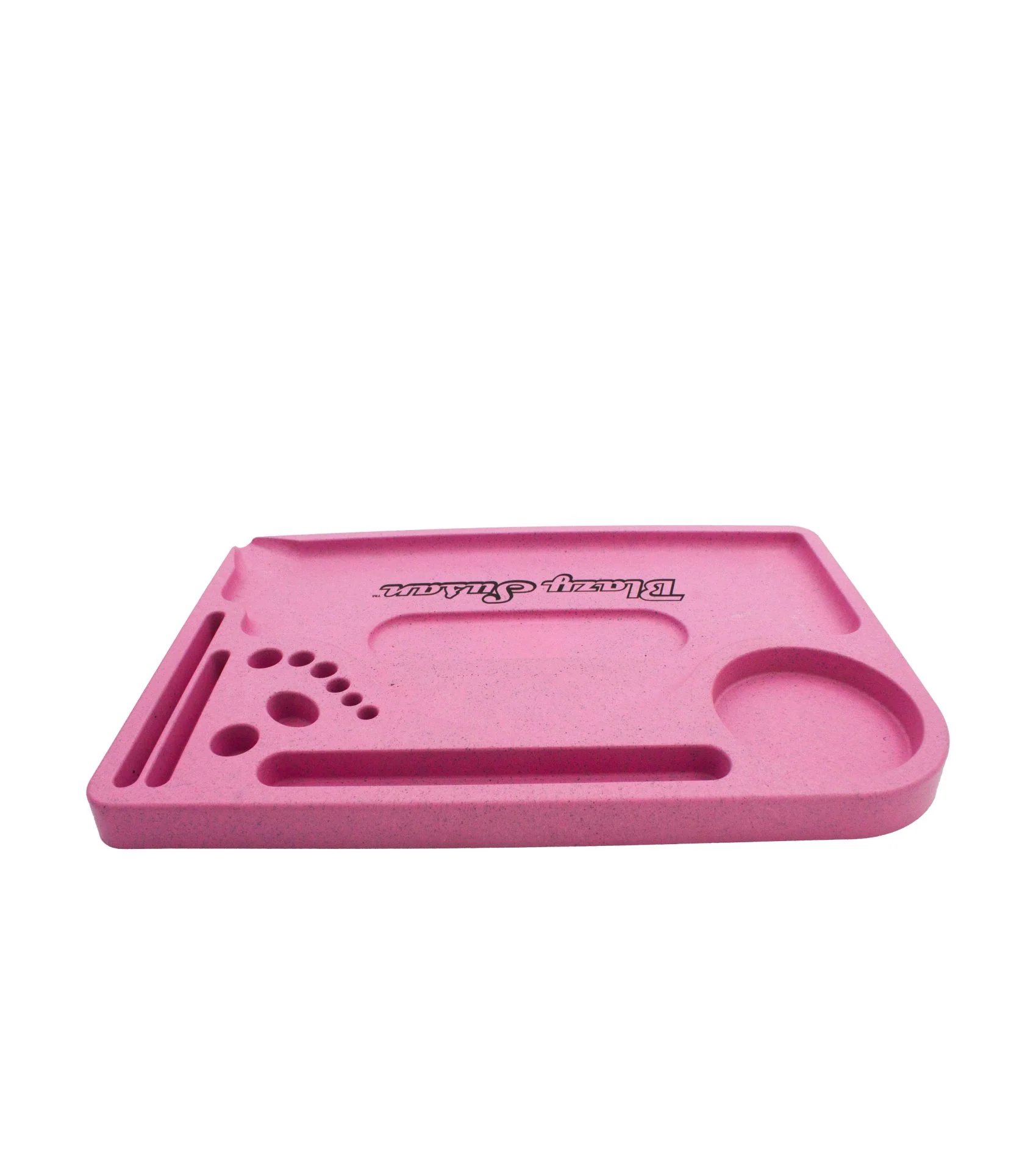 A pink tray with various compartments and holes, likely used for organizing and storing small items.