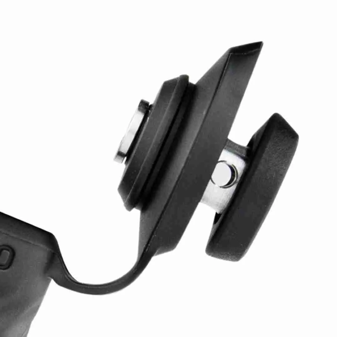 A close-up view of a black, curved object with a silver-colored attachment, possibly a piece of equipment or a tool.