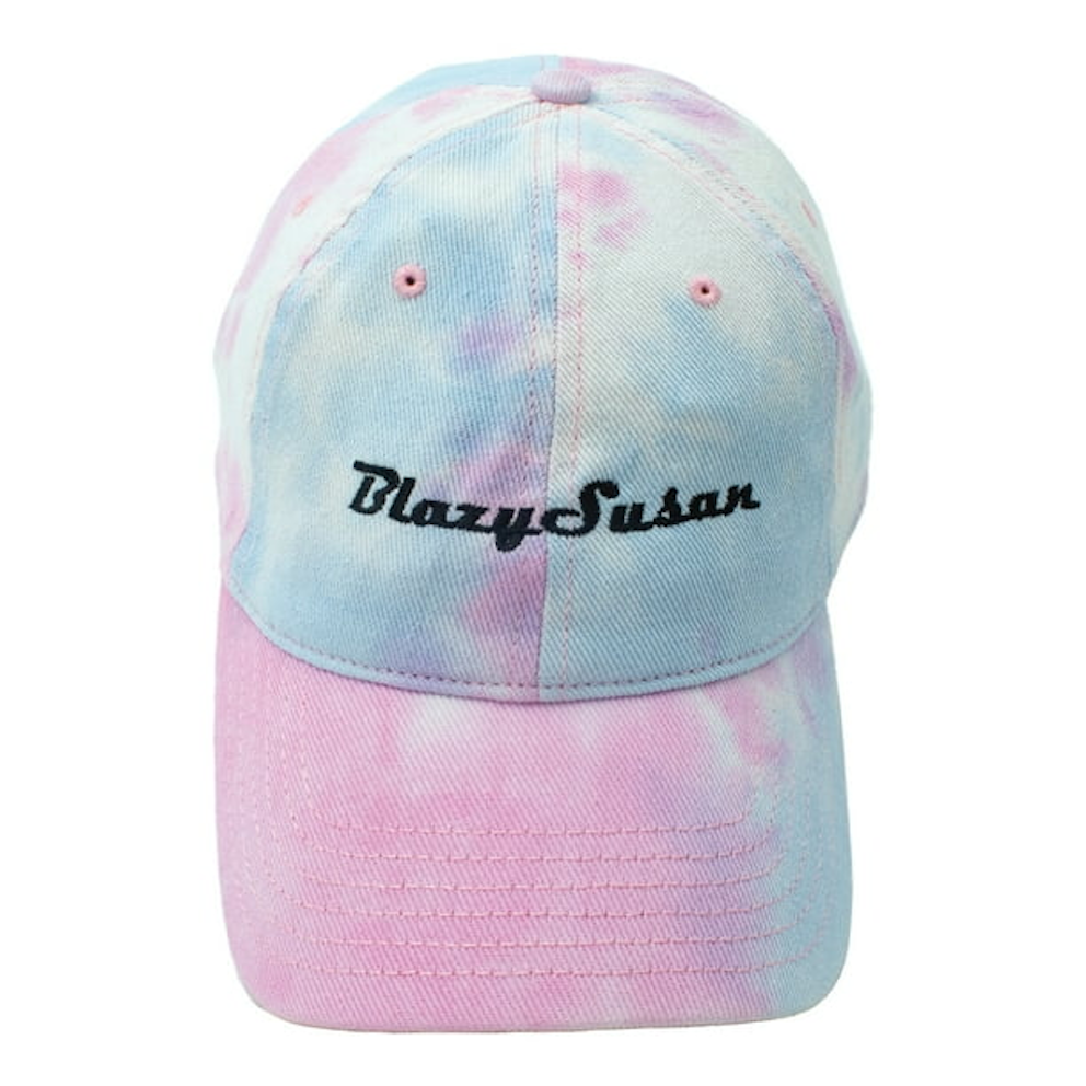A pink and blue tie-dye baseball cap with the text "Blazysister" printed on it.