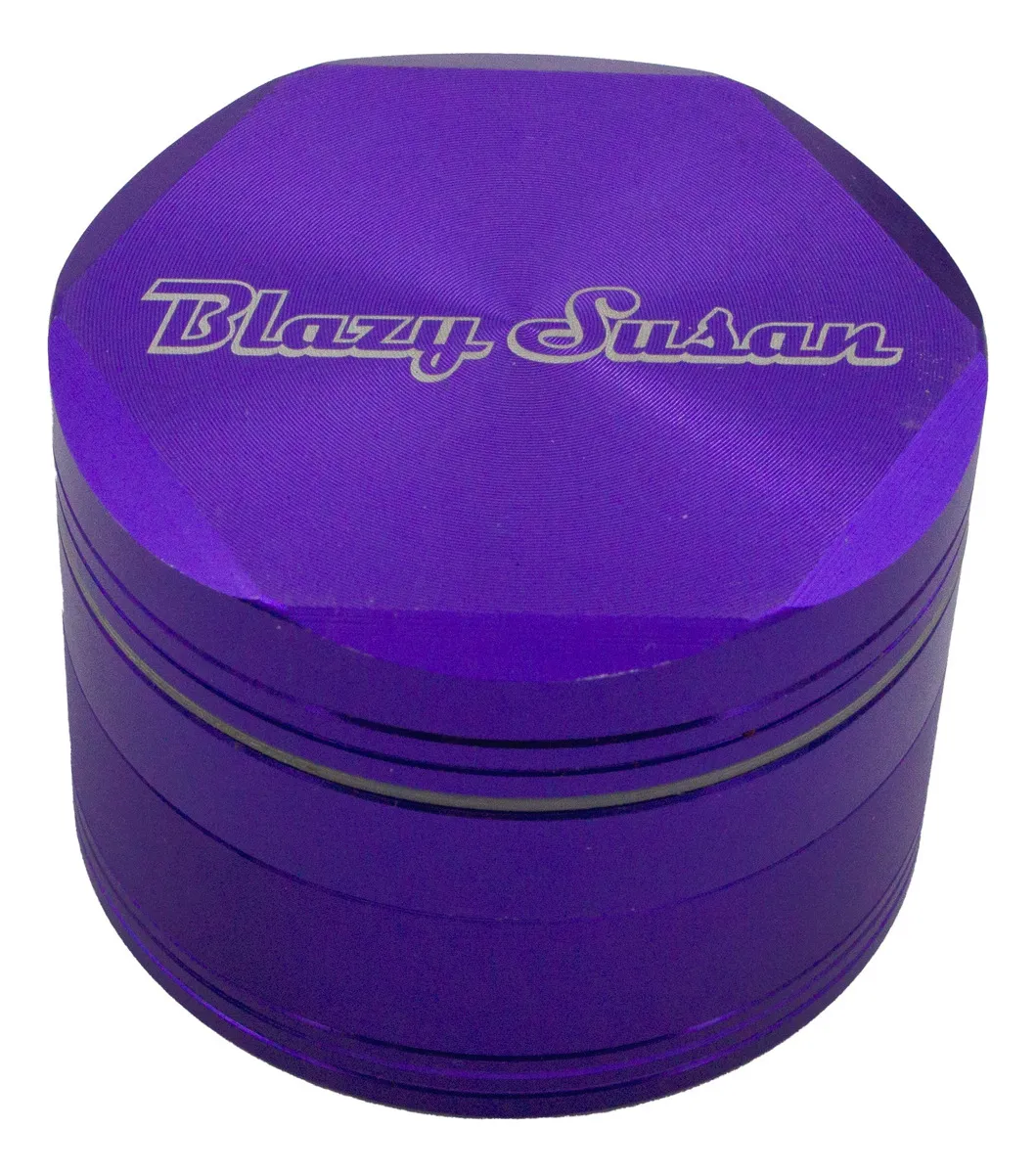 A purple, hexagonal grindstone with the text "Blazy Susan" printed on it.