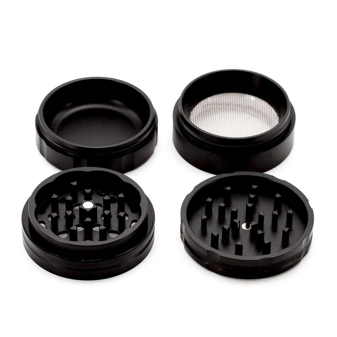 a collection of black grinders and filters arranged on a white background.