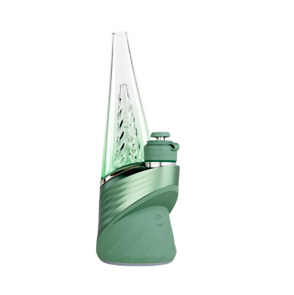 A green electronic device with a clear glass tube and a green base, possibly a piece of electronic equipment or a gaming accessory.