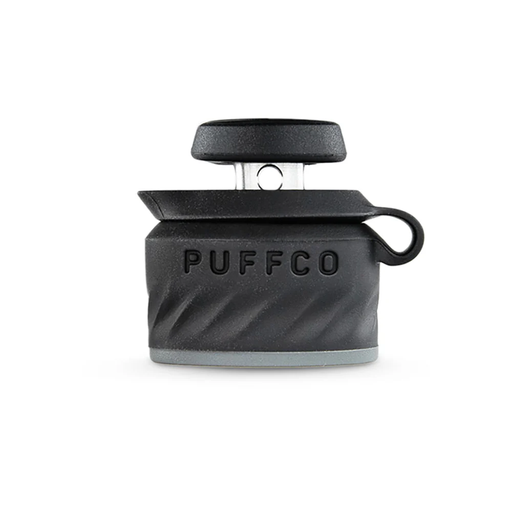 A black and gray object with the word "PUFFCO" printed on it.