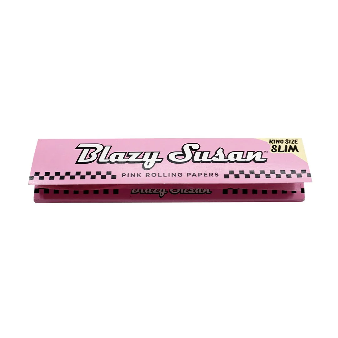 A pink and black box containing pink rolling papers, labeled as "Blazy Susan" and "King Size Slim".