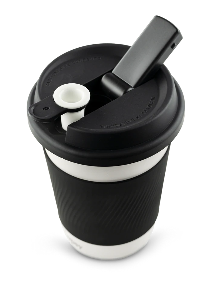 A black and white coffee cup with a black lid and a white handle.