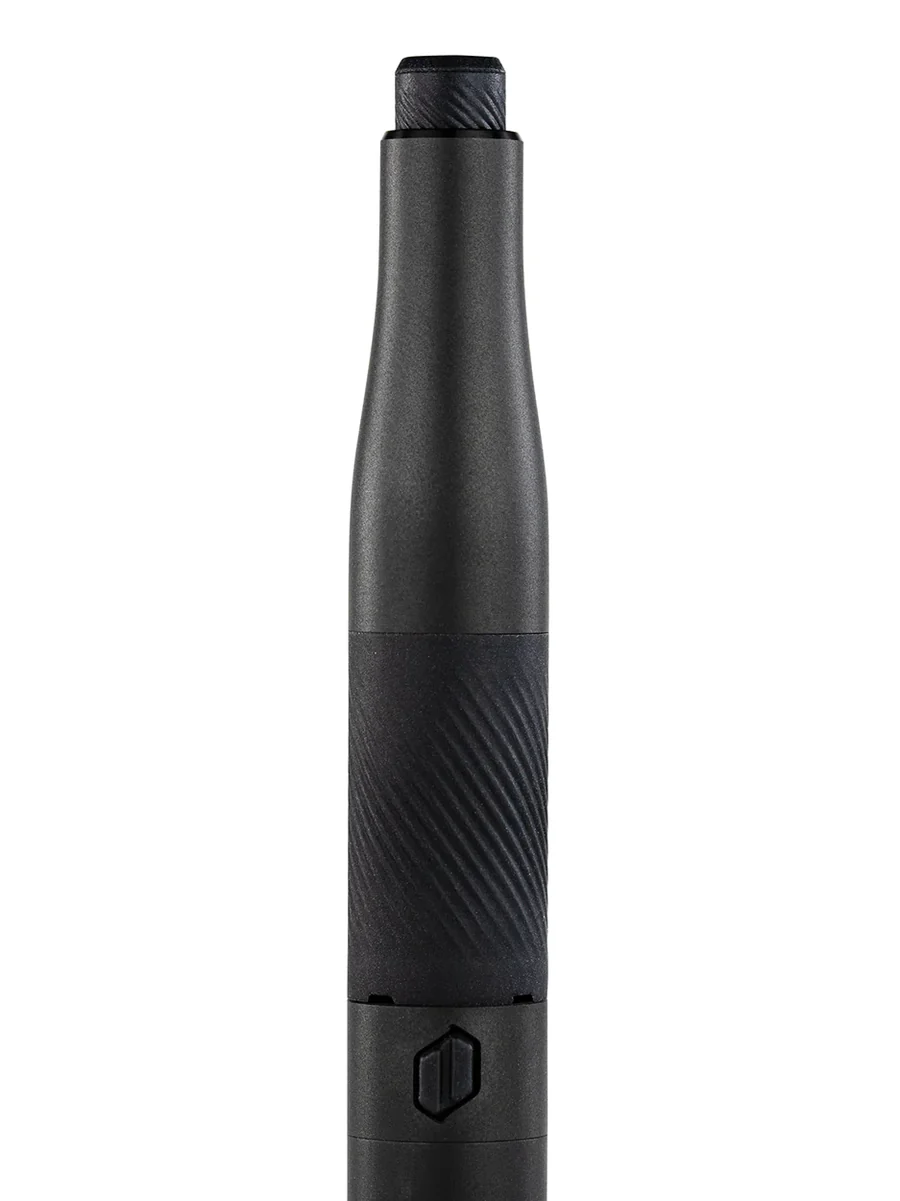 A sleek black electronic device, possibly a pen or stylus, is shown against a black background.