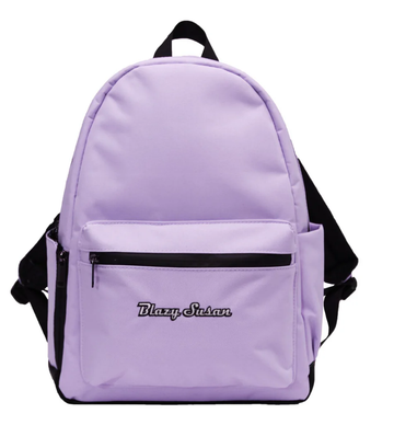 A purple backpack with a black handle and zipper.