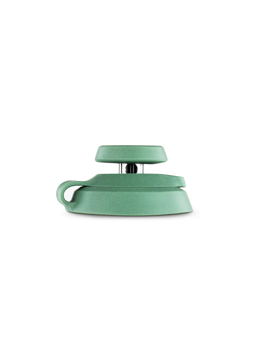 A green, curved object is shown against a black background.