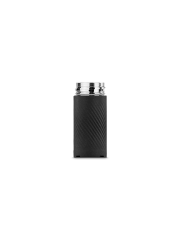 A cylindrical object with a metallic top is shown against a black background.