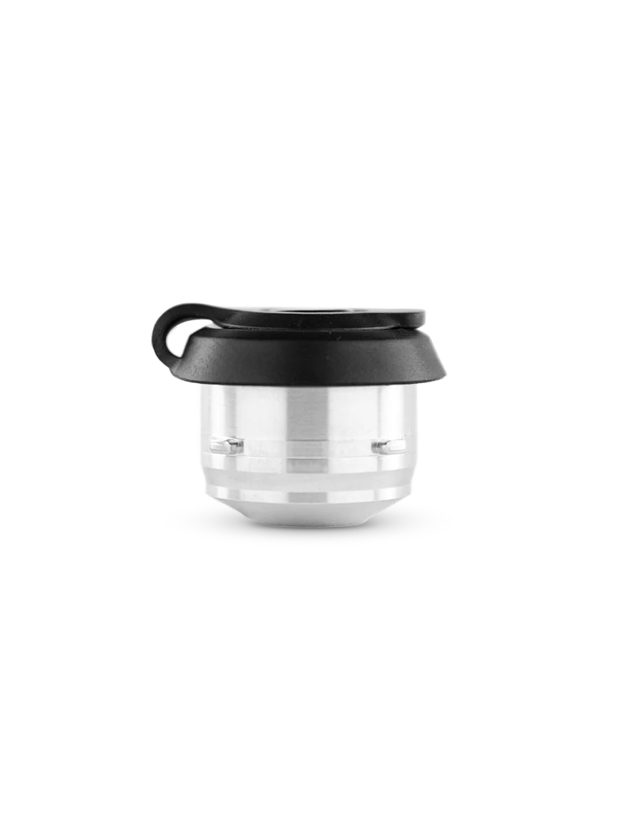 A black and silver object with a black handle, possibly a camera lens or a similar device, against a black background.