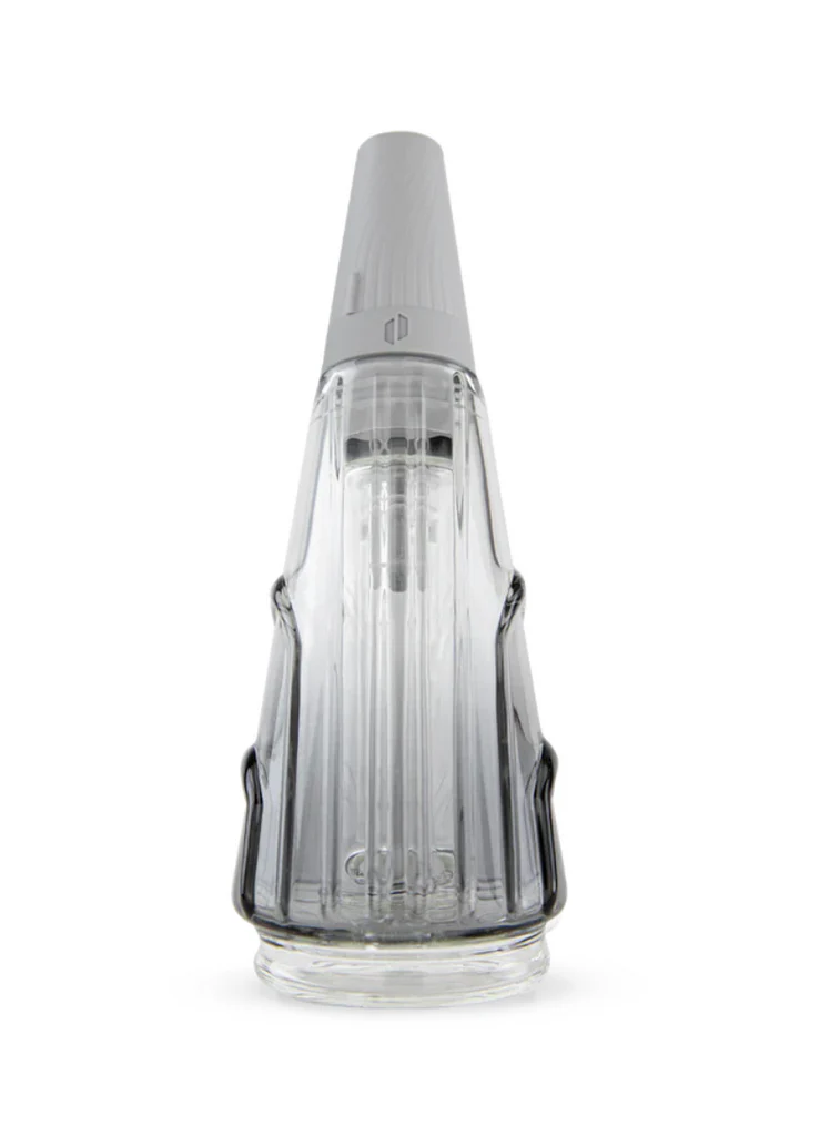 A clear glass bottle with a pointed top and a black base, standing upright against a white background.