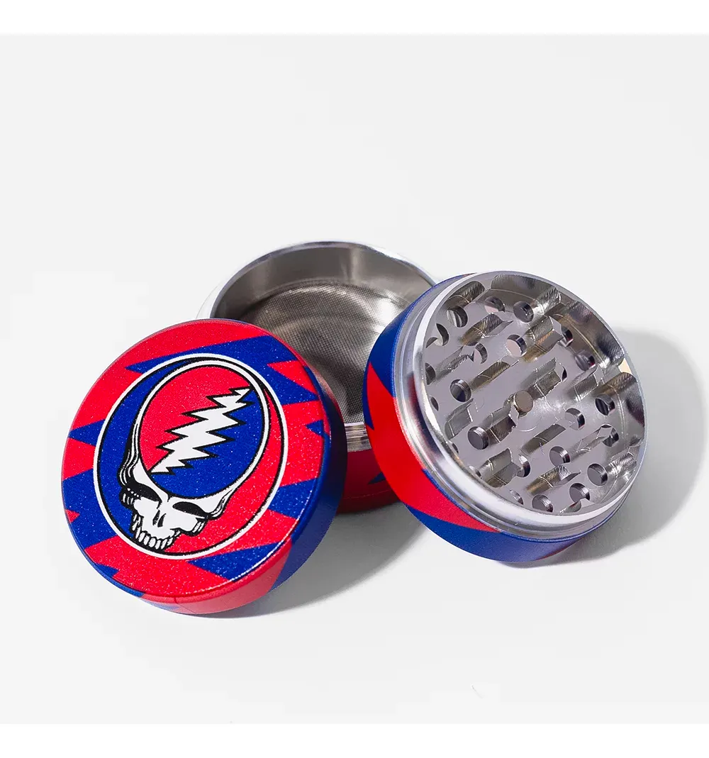 a red and blue grindstone with a skull design on it.