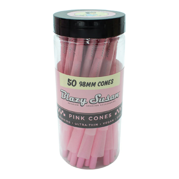 A clear plastic jar filled with pink-colored rolling papers, labeled as "Blazzy Susan's 50 98mm Cones".